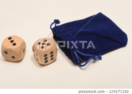 Dice on a white background. Large and small dice. Dice on a white background. Large and small dice. 124271192