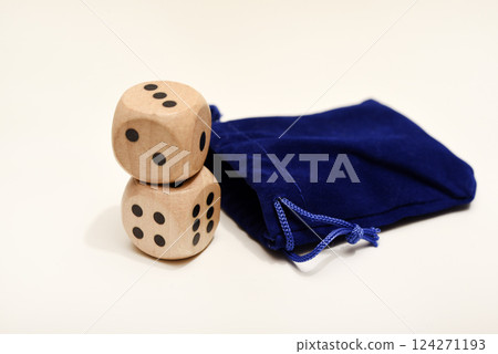Dice on a white background. Large and small dice. Dice on a white background. Large and small dice. 124271193