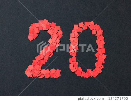 number twenty sign made from small pieces of red colored applique paper squares 124271790