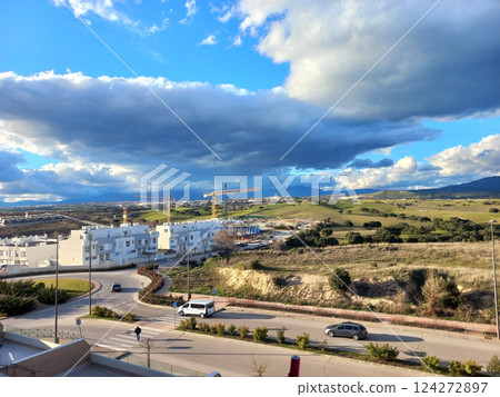 Scenic view of residential construction with cranes in spanish countryside 124272897