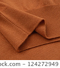 Elastic band of a terracotta orange knitted cotton polo t-shirt 124272949