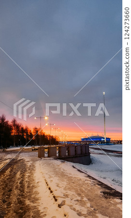 Fantastic winter landscape at fiery dawn. Walking paths in park 300 anniversary of St. Petersburg, Russia. Vertical photo. High quality photo Fantastic winter landscape at fiery dawn. Walking paths in park 300 anniversary of St. Petersburg, Russia. Vertical photo. High quality photo 124273660