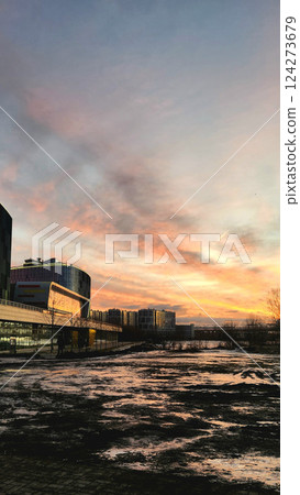 Fantastic winter landscape at dawn. Beautiful natural landscape of ice park with shining sunlight with reflections on ice. Saint Petersburg, Russia. Vertical photo. High quality photo 124273679