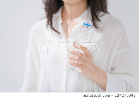 A woman with a bottle of water 124276342