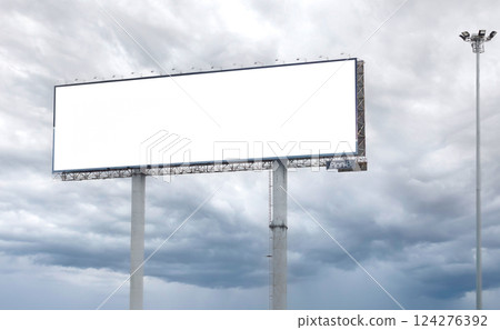 extra large Outdoor billboard with white background mock up. on clouds and blue sky background. Copy space for advertisement. extra large Outdoor billboard with white background mock up. on clouds and blue sky background. Copy space for advertisement. 124276392