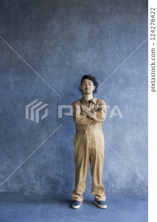 Man in overalls 124276422
