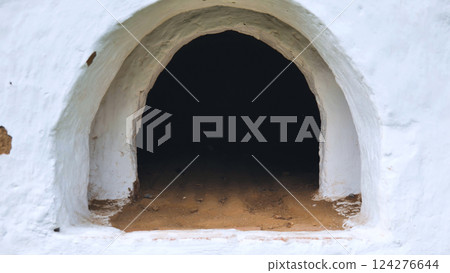 Traditional Russian oven, outdoors under a canopy. The picture was taken in Russia, in the city of Orenburg 124276644