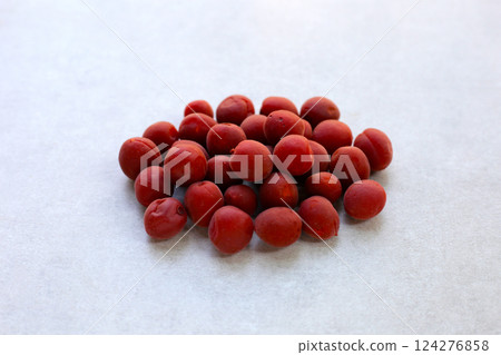 Umeboshi, Japanese pickled plums, Sour and salty taste. Umeboshi, Japanese pickled plums, Sour and salty taste. 124276858