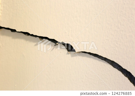 Building problem wall cracked., House structural foundation cracked. Building problem wall cracked., House structural foundation cracked. 124276885