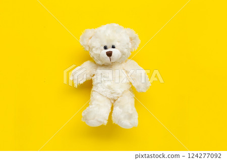 Teddy bear on copy space color background 124277092