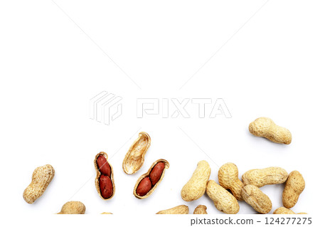 Roasted peanuts in shell on white background. 124277275