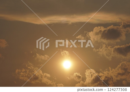 The sun coming out of the clouds 124277308