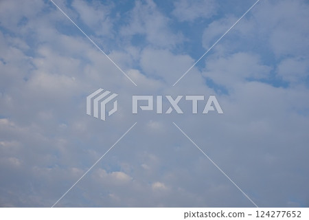 Clouds floating in the blue sky Clouds floating in the blue sky 124277652