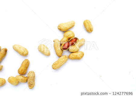 Roasted peanuts in shell on white background. 124277696