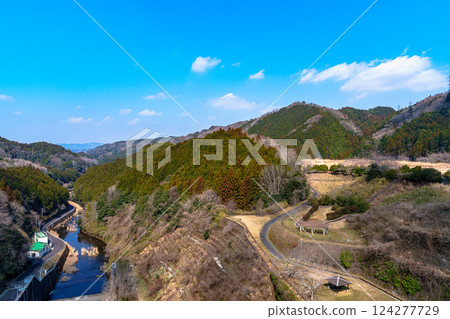 March 2025 Spring at Nunome Dam - The flow of the Nunome River and the mountainside that still retains its winter appearance② March 2025 Spring at Nunome Dam - The flow of the Nunome River and the mountainside that still retains its winter appearance② 124277729