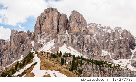 Majestic mountain peaks in scenic landscape with snow and pine trees near Valley of Funes at Dolomites, Italy Majestic mountain peaks in scenic landscape with snow and pine trees near Valley of Funes at Dolomites, Italy 124277782