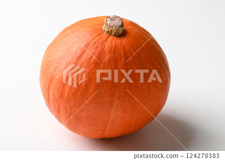 Orange Hokkaido pumpkin on white background Orange Hokkaido pumpkin on white background 124278383