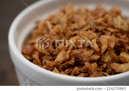Fried onions close-up Fried onions close-up 124278963