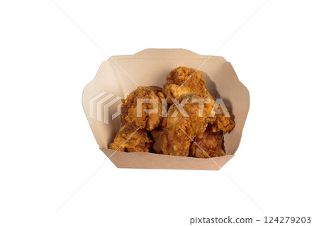 Fried chicken wings in batter in a package on a Fried chicken wings in batter in a package on a 124279203