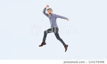 Full-body photo of a senior man jumping energetically 124279496