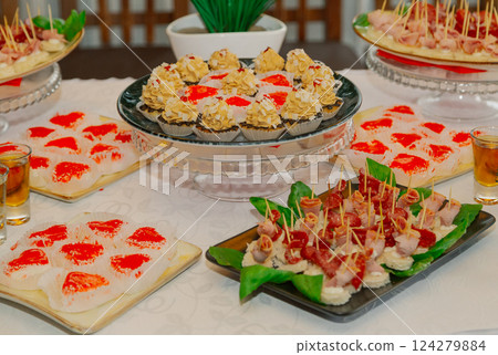 A beautifully decorated table with snacks on it 124279884