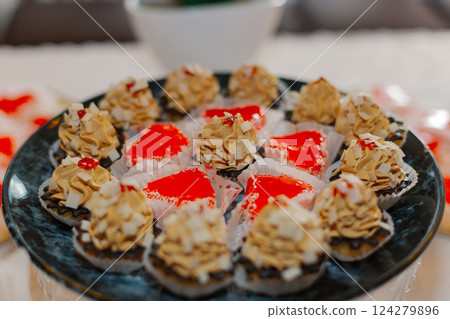 beautiful two types on a black plate on a festive beautiful two types on a black plate on a festive 124279896