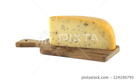 Large slice of cumin cheese resting on wooden cutting board Large slice of cumin cheese resting on wooden cutting board 124280793