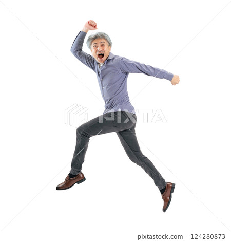 A senior man jumping energetically. A transparent full-body photo PNG precisely cut by hand 124280873