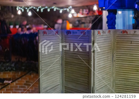 A white fence in a room separating this room with 124281159