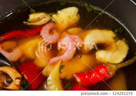 Appetizing looking seafood soup with mussels 124281255