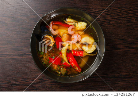 Appetizing looking seafood soup with mussels 124281267