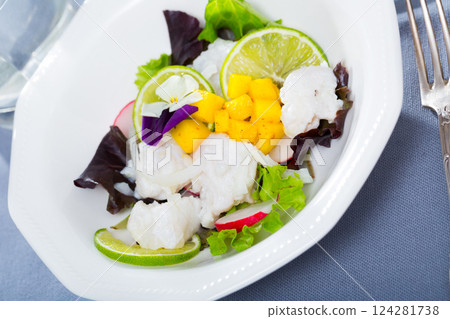 Sea food - cod ceviche with mango 124281738