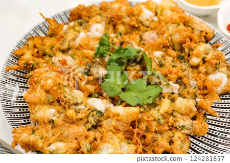 close up of Chinese Chaozhou style deep fried Oyster omelette  124281857
