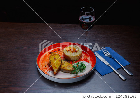 Grilled fresh red fish lies on a plate along with Grilled fresh red fish lies on a plate along with 124282165