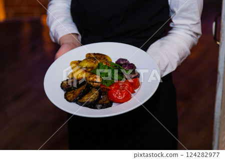 Grilled baked vegetables in a white plate in the Grilled baked vegetables in a white plate in the 124282977