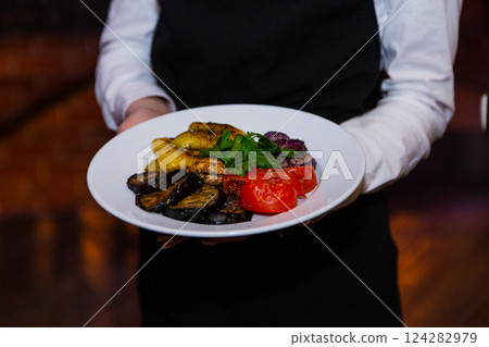 Grilled baked vegetables in a white plate in the Grilled baked vegetables in a white plate in the 124282979