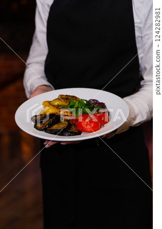 Grilled baked vegetables in a white plate in the Grilled baked vegetables in a white plate in the 124282981
