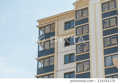 Facade of a modern residential building. New 124283178