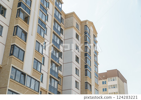 Facade of a modern residential building. New 124283221