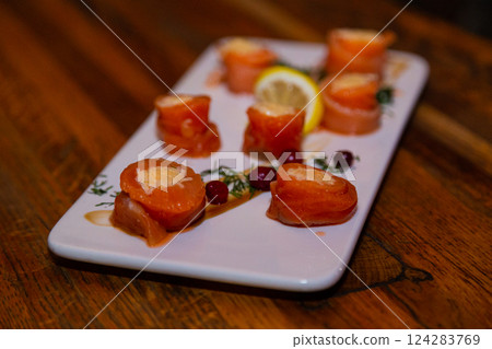 Appetizing fish rolls from red fish with stuffing 124283769