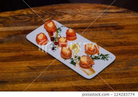 Appetizing fish rolls from red fish with stuffing 124283774