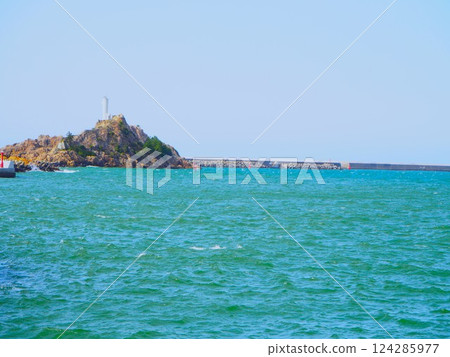 Floating island and lighthouse 124285977