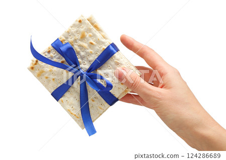 Passover, Hand presents a matzo package, isolated on white, PNG Passover, Hand presents a matzo package, isolated on white, PNG 124286689