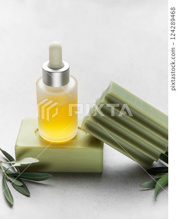 Olive oil serum and soap bars enhancing natural skincare routine 124289468