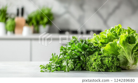 Fresh and vibrant assortment of leafy greens including butter lettuce and parsley in a modern kitchen. concept of healthy eating, fresh ingredients, organic cooking, vegetarian meal prep, copy space. 124289680