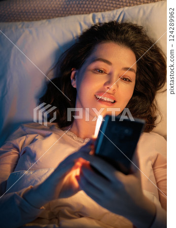 Woman is sleeping in her bedroom Woman is sleeping in her bedroom 124289962