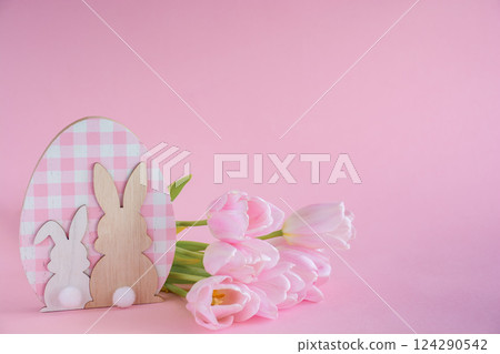 Easter Decoration with Pink Tulips on Pink Background with Copy Space Easter Decoration with Pink Tulips on Pink Background with Copy Space 124290542