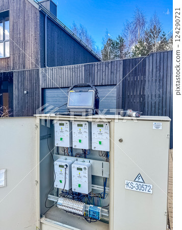Electrical equipment.energy meter is a device that measures the amount of electric energy consumed by a residence. High quality photo 124290721