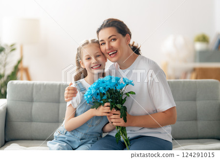 daughter and mom with flowers 124291015