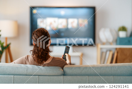 Woman watching  TV 124291141